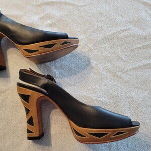 John Fluevog Bunford black and tan leather Slingback Heels.